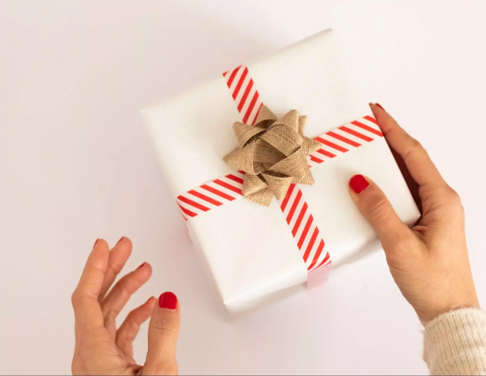 person-giving-christmas-gift