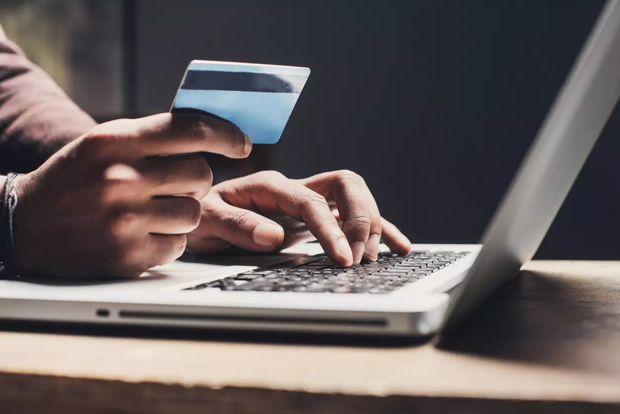 man-shopping-online-using-credit-card