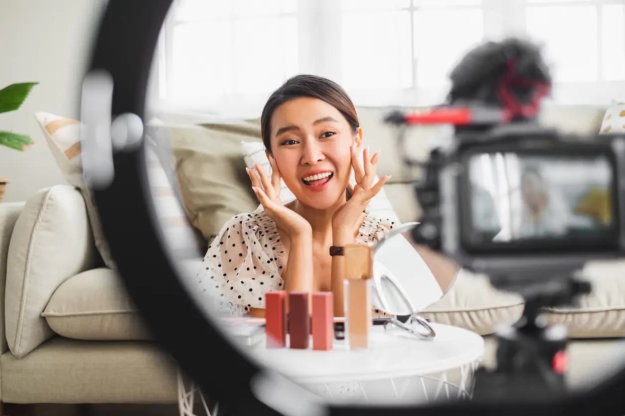 asian-woman-videoing-makeup-review-for-beauty-blog